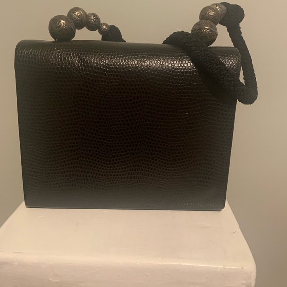 Black handbag with an alligator embellishment. - Picture 3 of 4